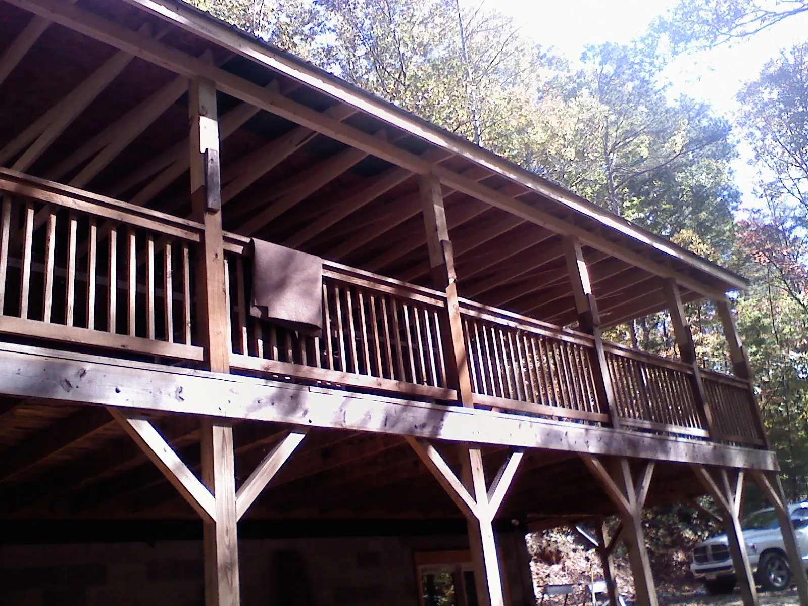 Timber framing under a new elevated porch and deck — Roof Leak Repair in Talmo by Roofing Brothers